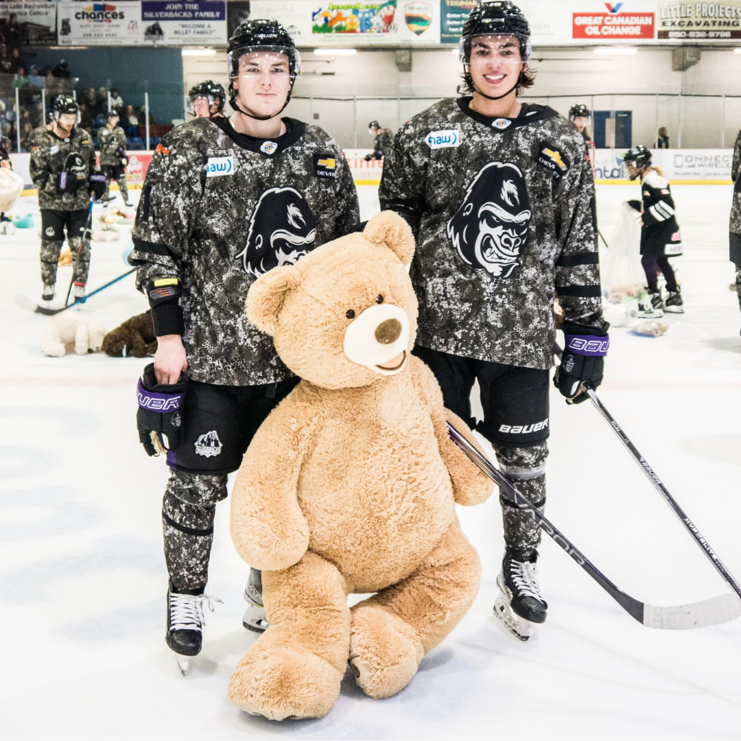 hockey players with bear